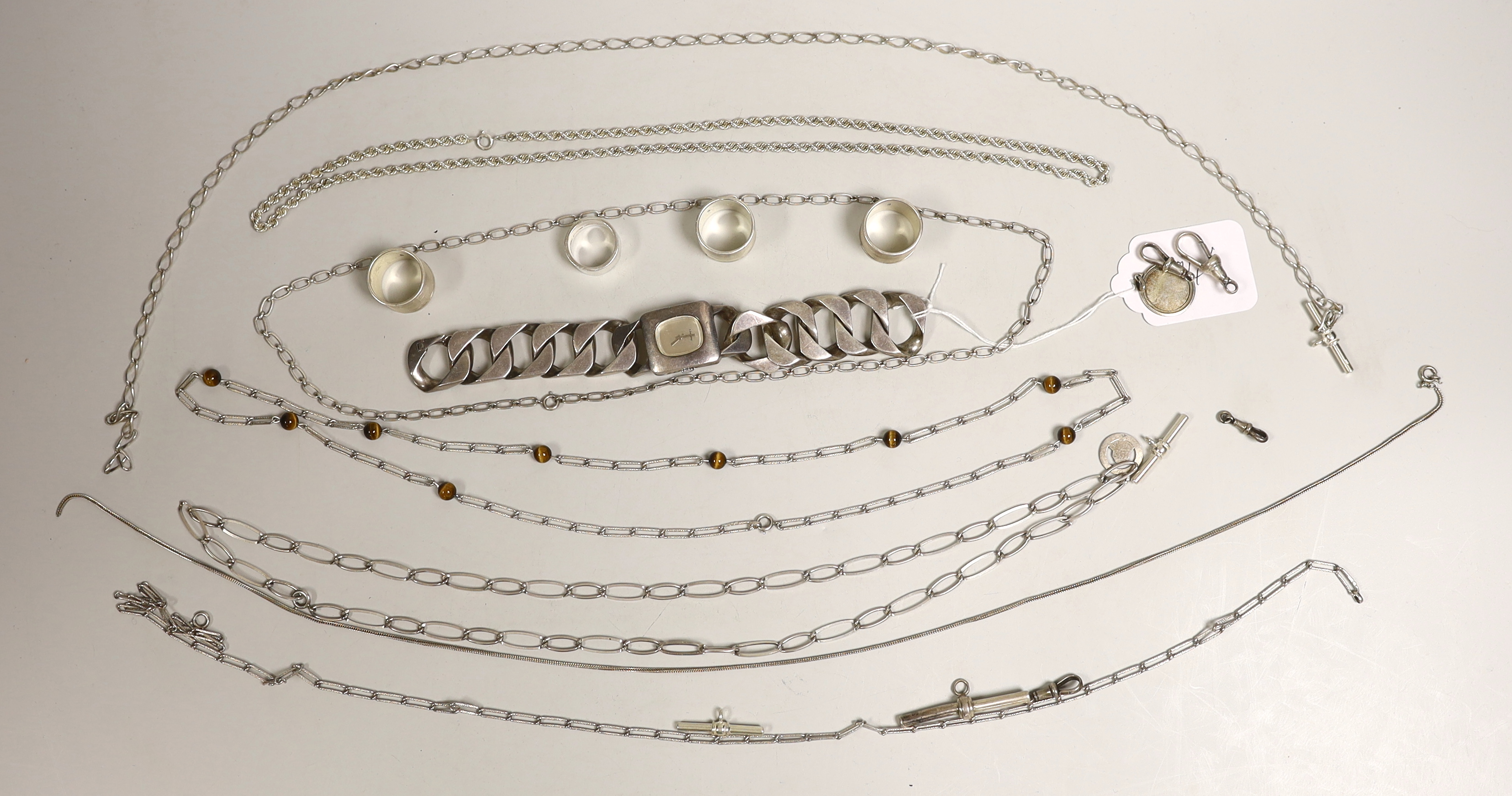 Sundry silver and white metal jewellery etc. including T-bars, necklaces, rings and a large curb link bracelet watch.